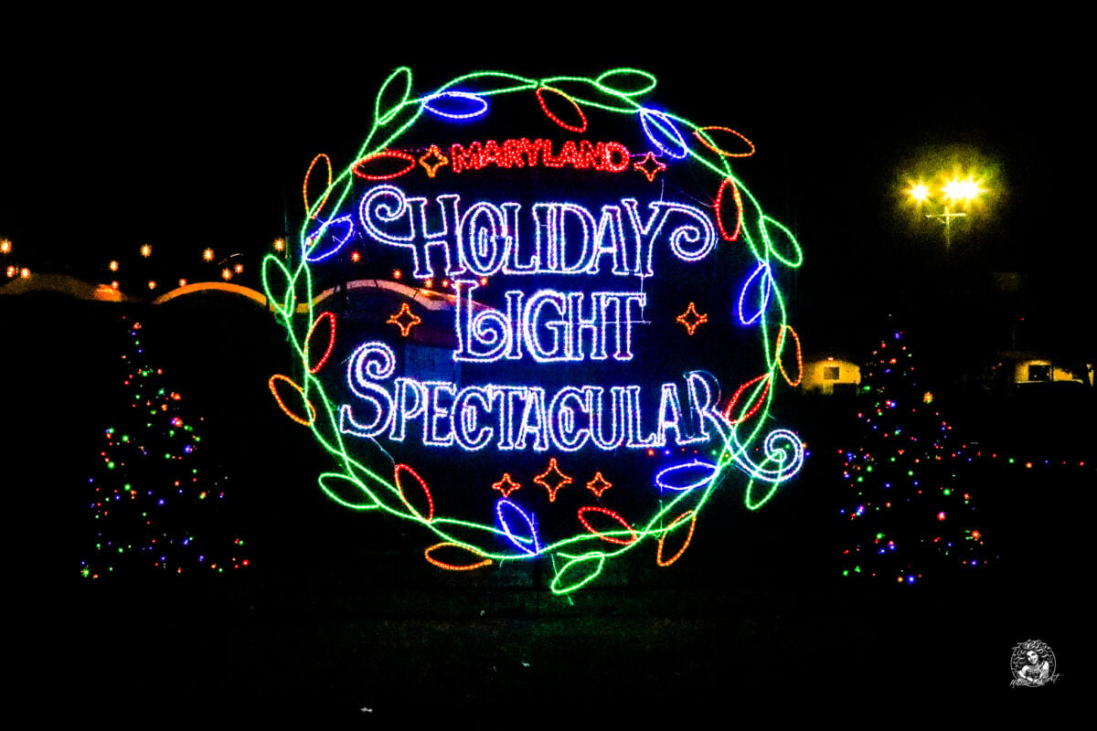 Guests walking the illuminated half-mile Christmas light trail at the Maryland State Fairgrounds in Timonium